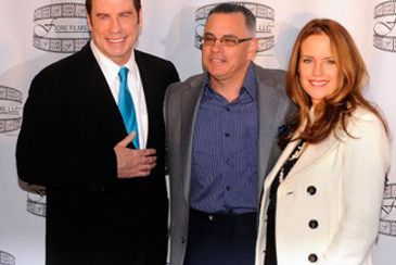 Travolta, Gotti and Preston at a press conference for the biopic
